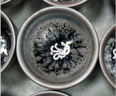 中国 注文のロゴの動物パターン コップの技術が付いている水型の陶磁器のマグ 工場