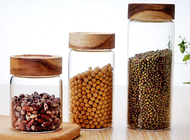 中国 長命木製のふたを持つ豆のための明確な注文のガラス食糧貯蔵の瓶 工場